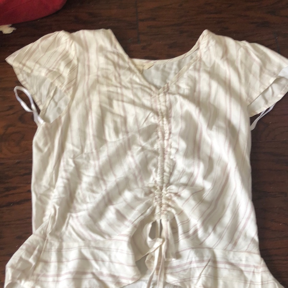 i’m selling this cute top!! it’s from Sim and Sam. it’s a Large